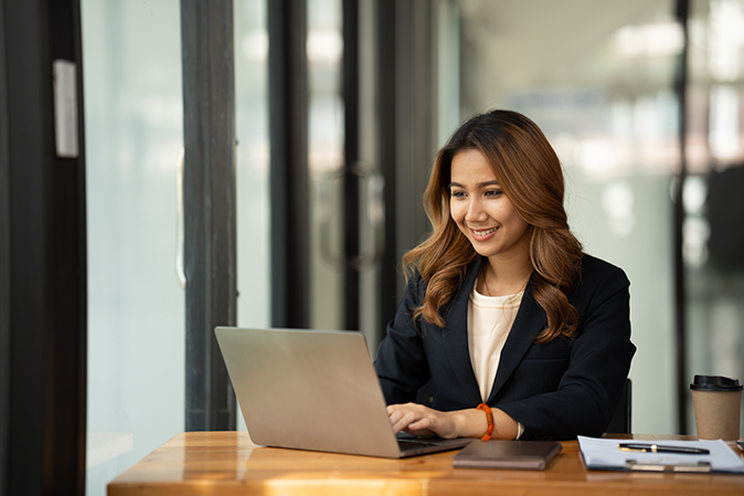 Solicitor in her office with her laptop