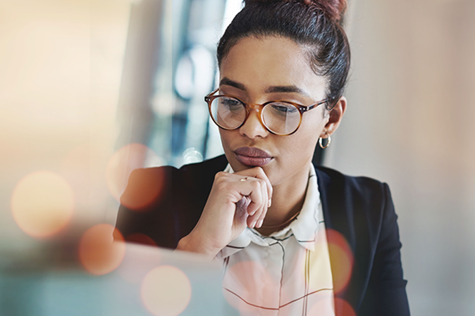 Business woman, thinking and planning on computer for Human Resources solution, recruitment website or vision. Professional HR worker or employee ideas and problem solving on laptop and banner mockup.