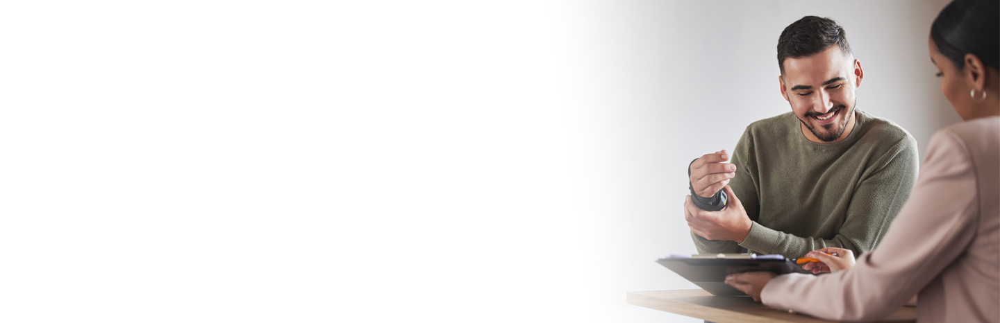 Female lawyer working with a male client on their injury case