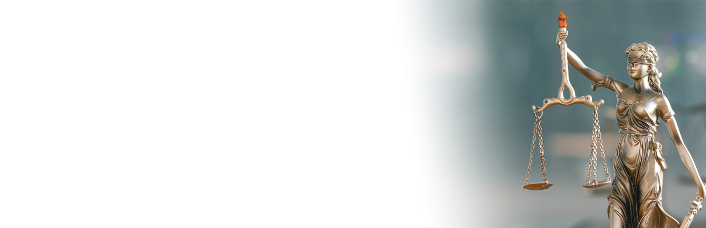 Scales of justice statuette