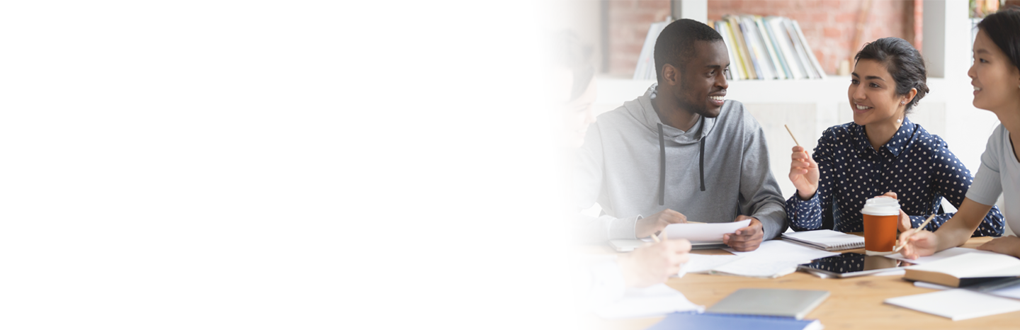 Young woman pointing pencil in a discussion with her study group