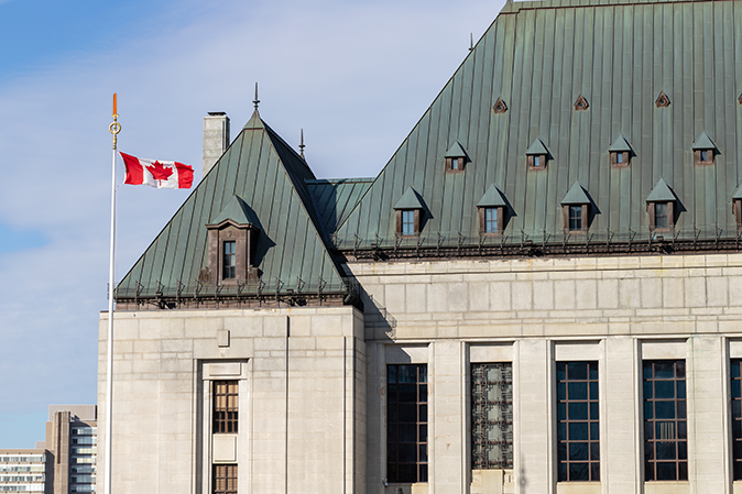 Supreme Court of Canada building with flag