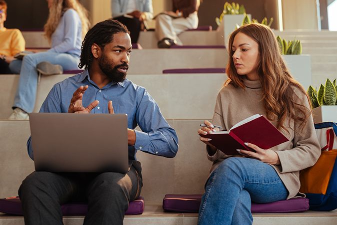 Professor working with a student in class